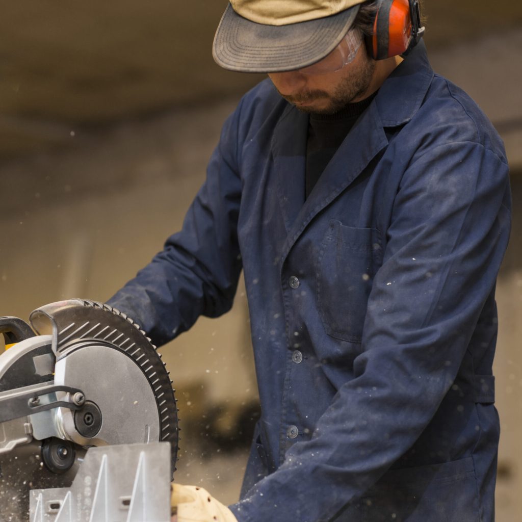 professional-carpenter-uses-circular-saw-workshop