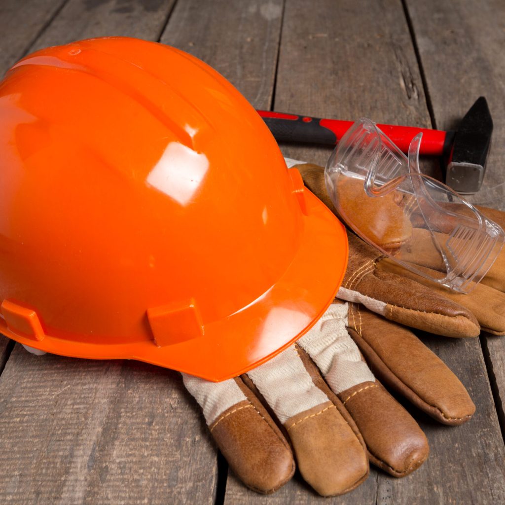 Work protection concept on wooden table. top view